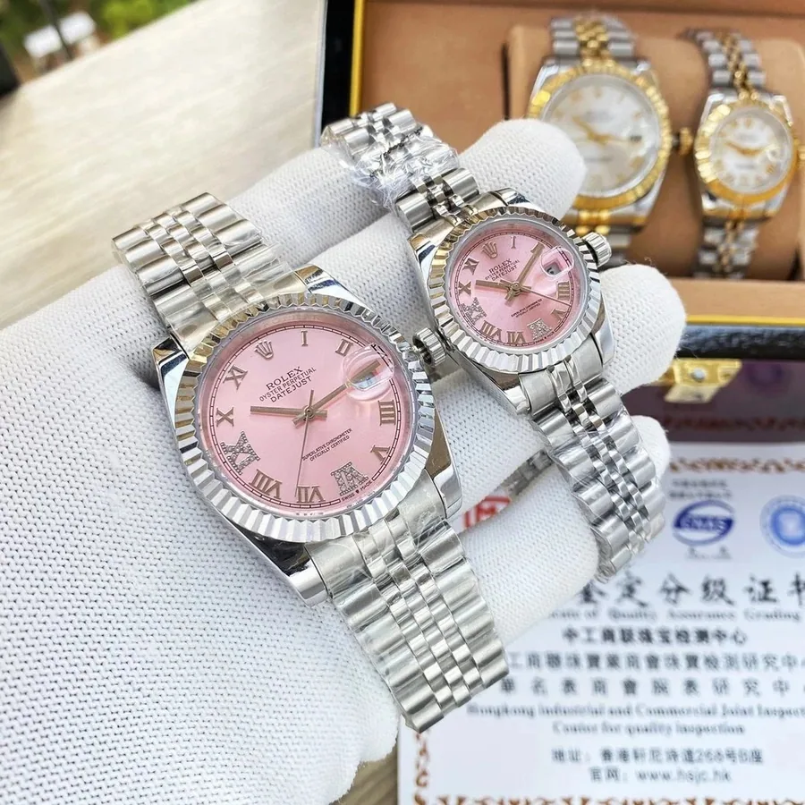 Rolex Oyster Perpetual Datejust Pink Dial Roman Numeral Steel Watch — listing photograph