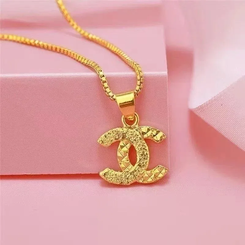 Chanel CC Logo Pendant Necklace Gold Textured Finish — listing photograph