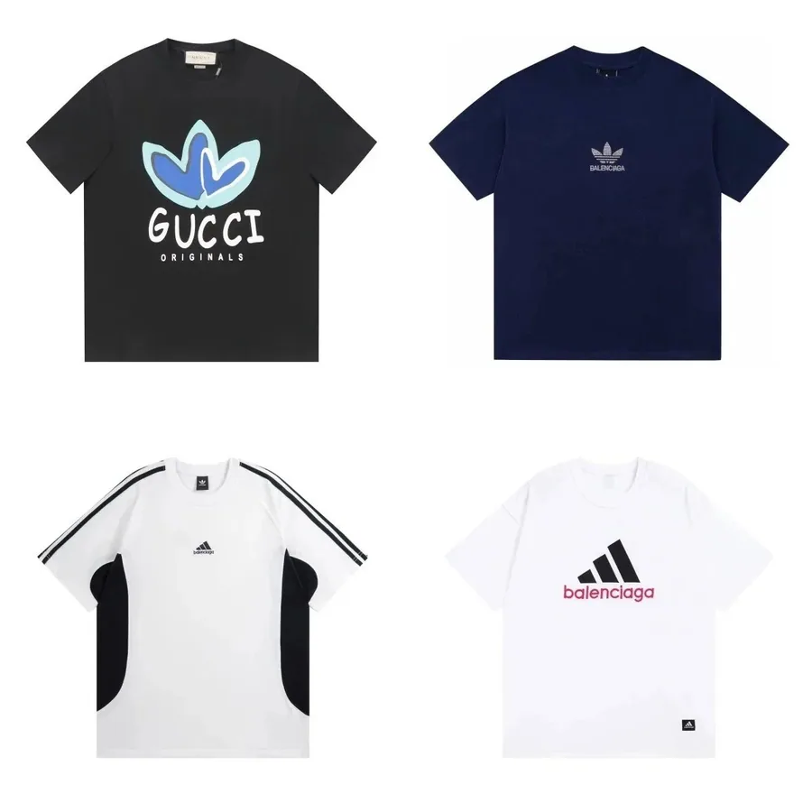 Gucci Originals Black T-Shirt with Blue Floral Logo Print — listing photograph