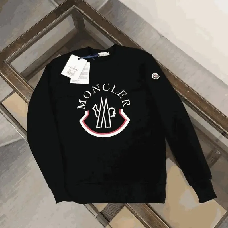 Moncler Black Crewneck Sweater with Iconic Logo Patch — listing photograph
