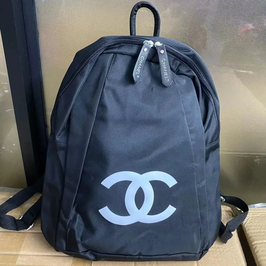 Chanel Black Nylon Backpack with Large CC Logo — listing photograph