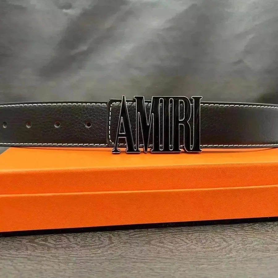 AMIRI Black Leather Belt with Bold Logo Buckle and White Stitching — listing photograph