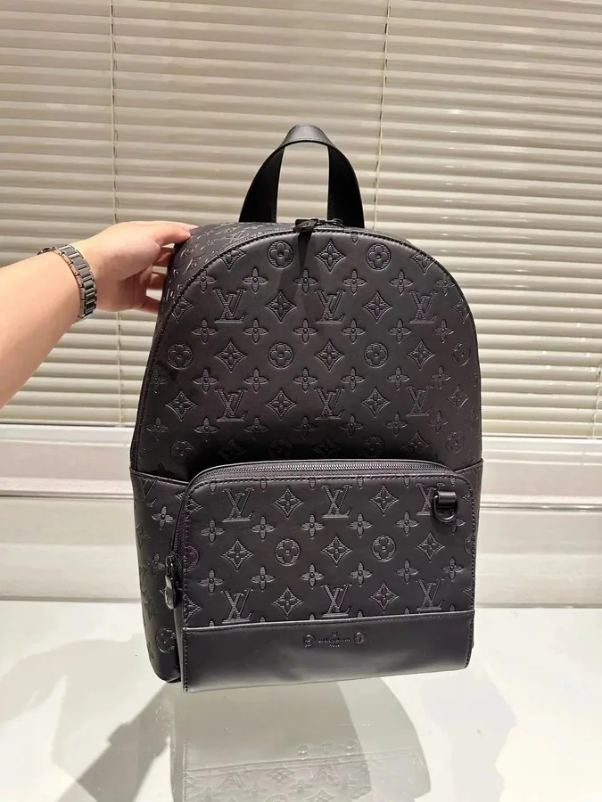 Louis Vuitton Monogram Empreinte Black Leather Backpack — listing photograph