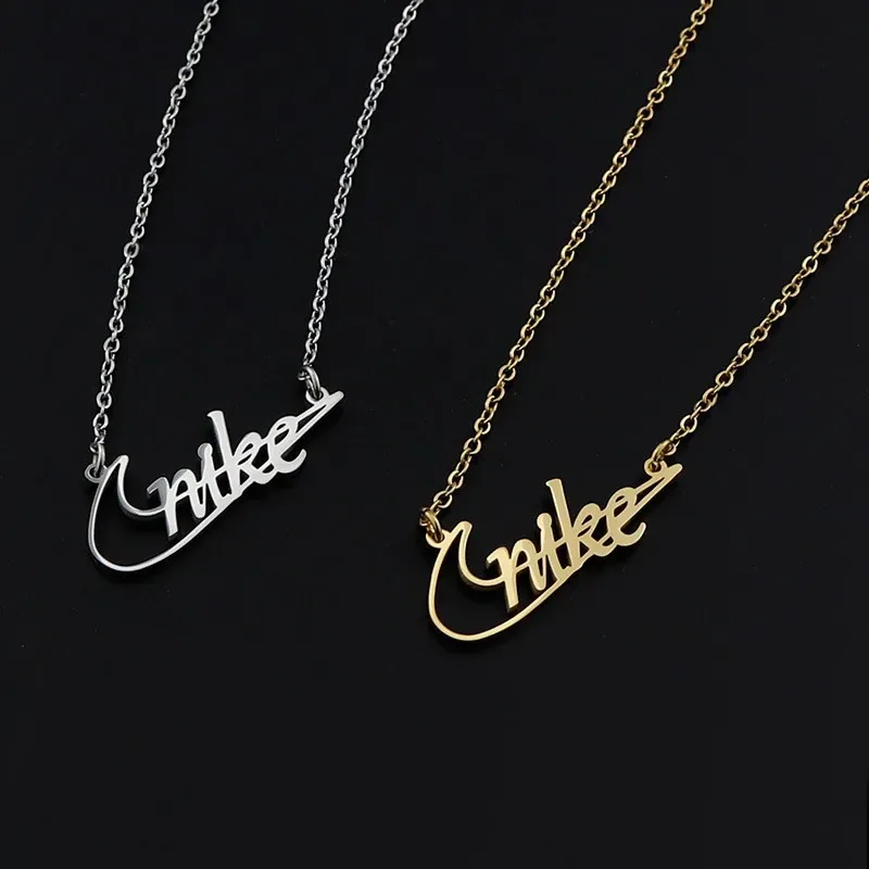 Nike Script Logo Pendant Necklace - Silver and Gold Chain — listing photograph