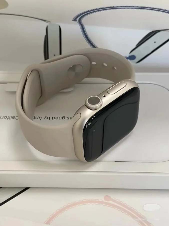 Apple Watch Series 9 Silver Aluminum with Starlight Sport Band — listing photograph