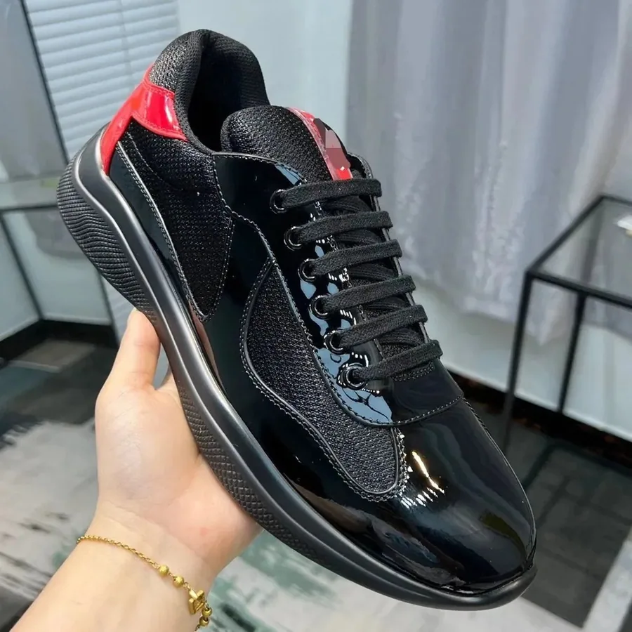 Prada Linea Rossa Black Patent Leather Sneaker with Red Accent — listing photograph