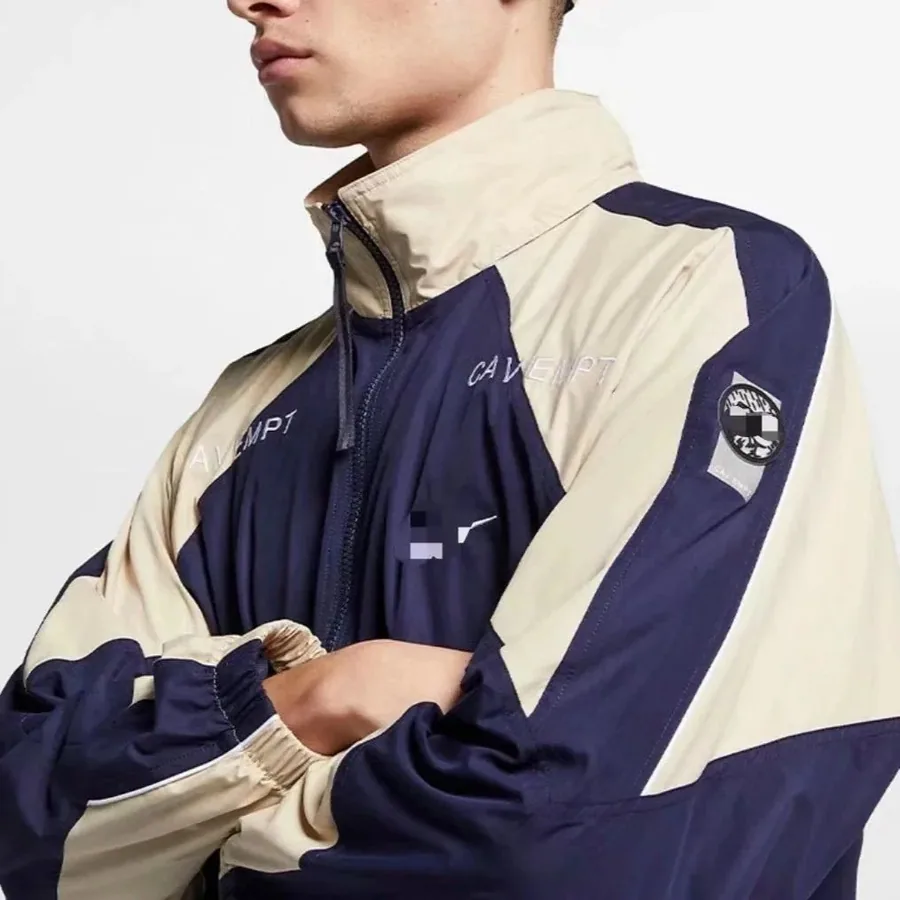 CAVEMPT Track Jacket Navy-Beige Colorblock with Logo Patch — listing photograph