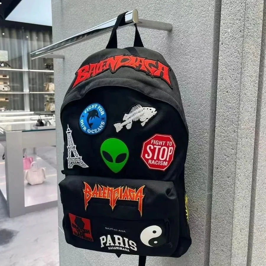 Balenciaga Patchwork Logo Backpack Black — listing photograph