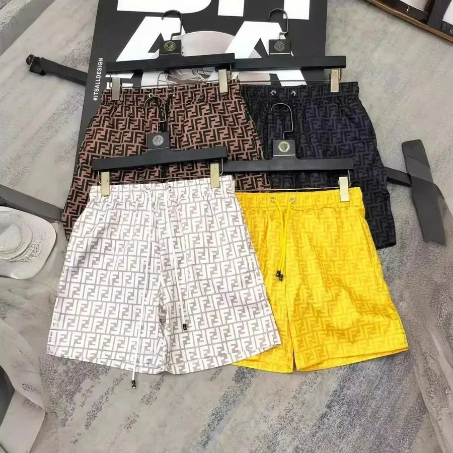 Fendi FF Logo Print Swim Shorts - Yellow Black Brown White — listing photograph