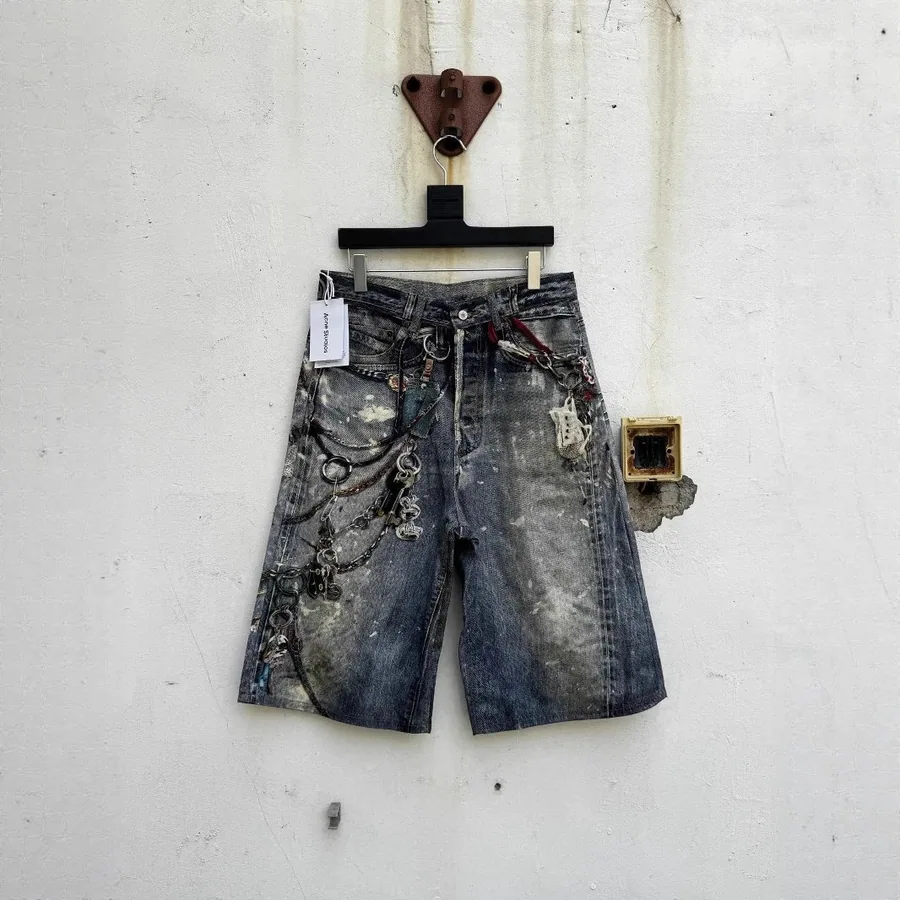 Acne Studios Distressed Denim Shorts with Chain Embellishments — listing photograph