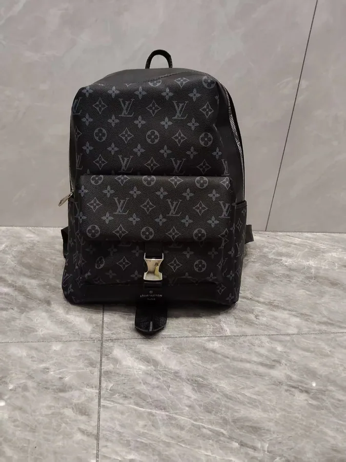 Louis Vuitton Monogram Eclipse Black Backpack with Silver Buckle — listing photograph